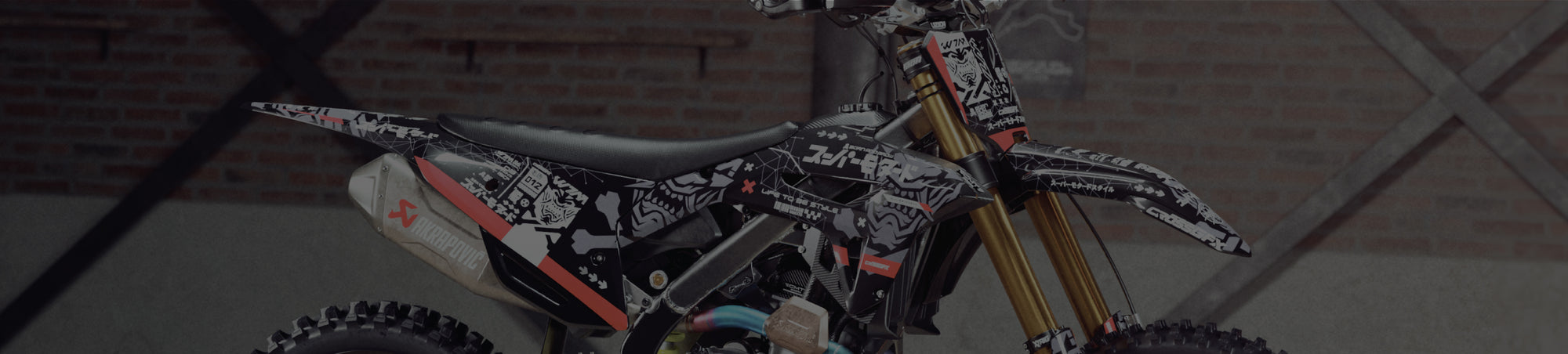 Honda CRF dirt bike with CrossGFX black and white skull decal kit