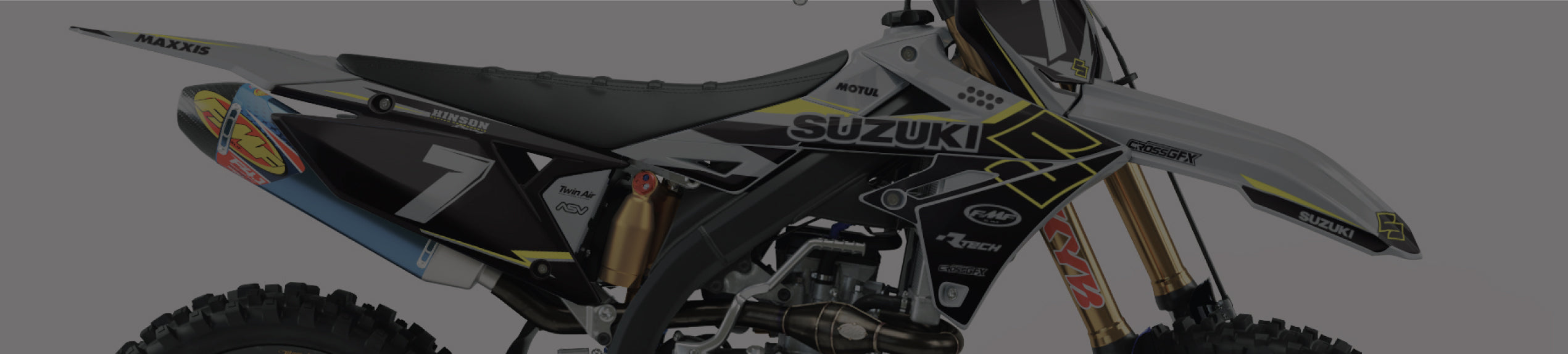 Suzuki RMZ dirt bike with CrossGFX Grey, Black and Yellow decal kit