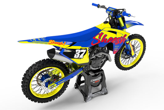 Rear view of the Sheesh Yellow custom decal kit on a GasGas motorcycle.