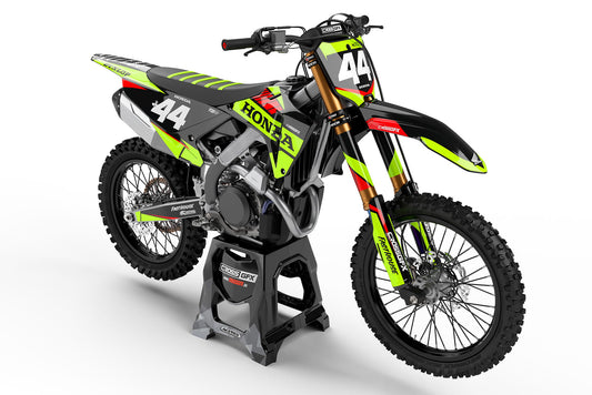 Front view of the Blitz Fluorescent graphics kit on a Honda motocross bike.