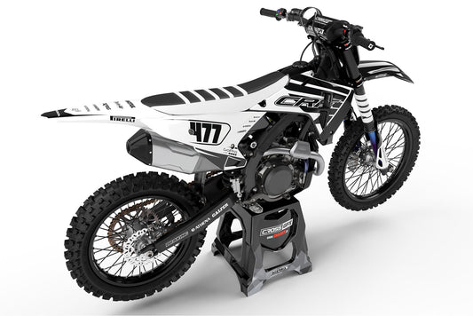 Rear view of the Crisp White custom graphics kit on a Honda dirt bike.