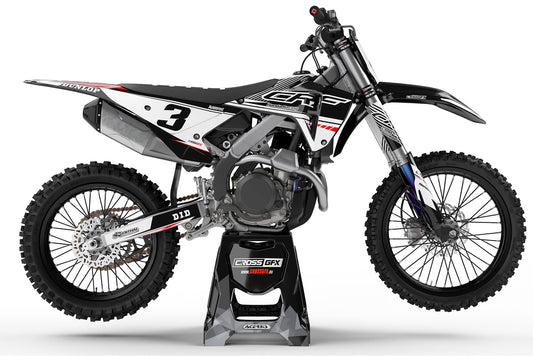 Left side view of the Force White graphics kit on a Honda dirt bike.