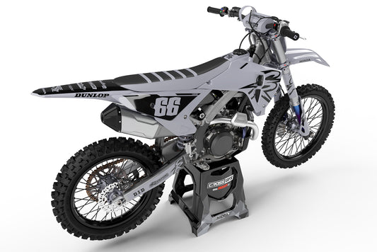 Rear view of the Retro 94 Grey custom decal kit on a Honda dirt bike.