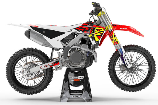 Side view of the Retro 97 Red custom decal kit on a Honda dirt bike.