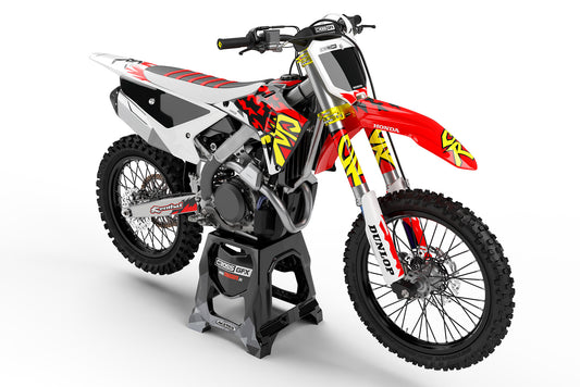 Front view of the Retro 97 Red graphics kit on a Honda off-road motorcycle.