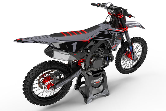 Rear view of the Surge Grey graphics kit on a Honda dirt bike.