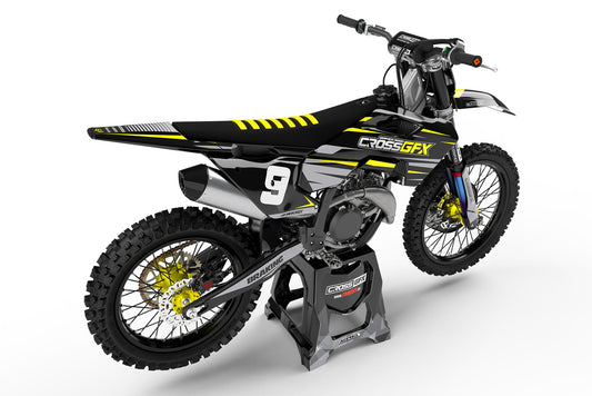Rear view of the Apex Black decal kit on a Husqvarna off-road bike.