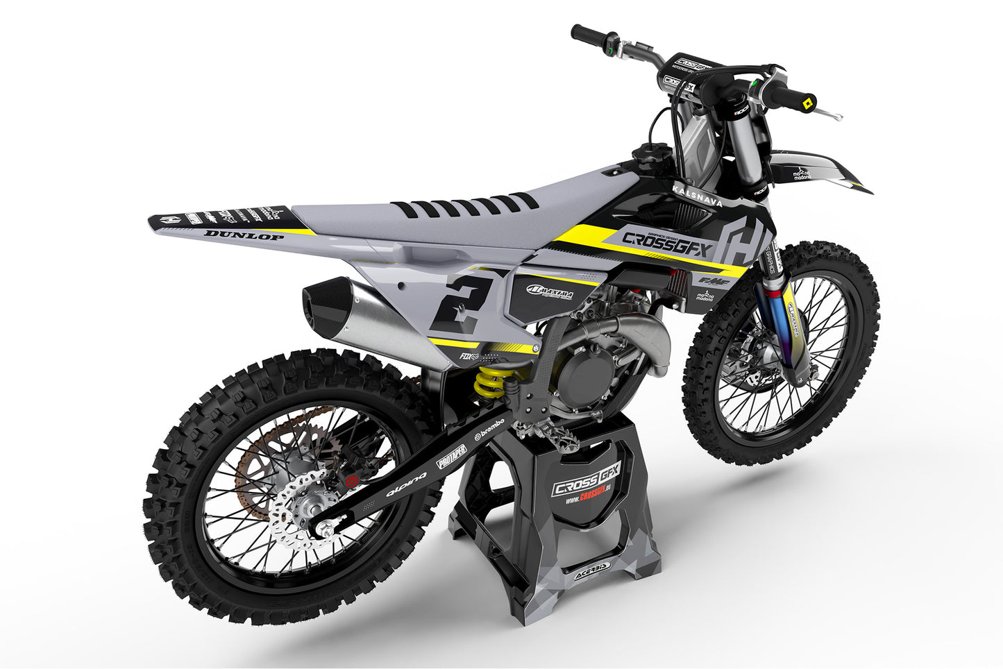Rear view of the Xcel Black racing graphics kit on a Husqvarna dirt bike.