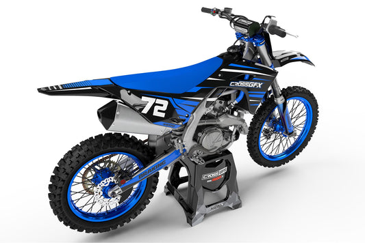 Rear view of the APEX Blue graphics kit on a Kawasaki dirt bike.