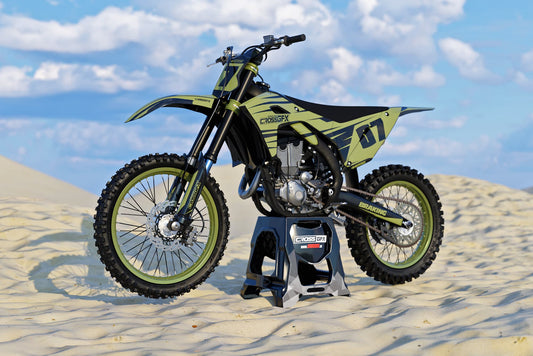 Promotional image of the APEX Military graphics kit for a Kawasaki motocross bike.