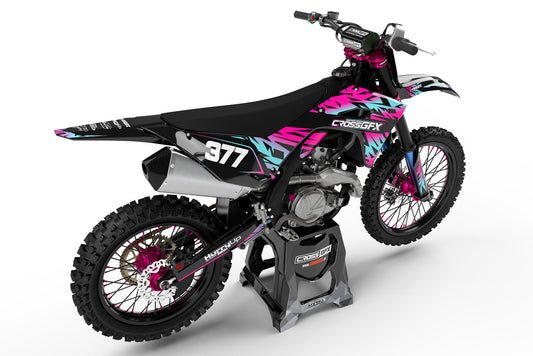 Rear view of the ELEMENT Black graphics kit on a Kawasaki dirt bike.