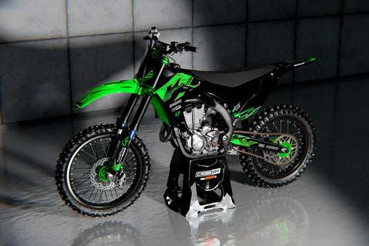 Promotional image of the PEAK Green graphics kit for a Kawasaki motocross bike.