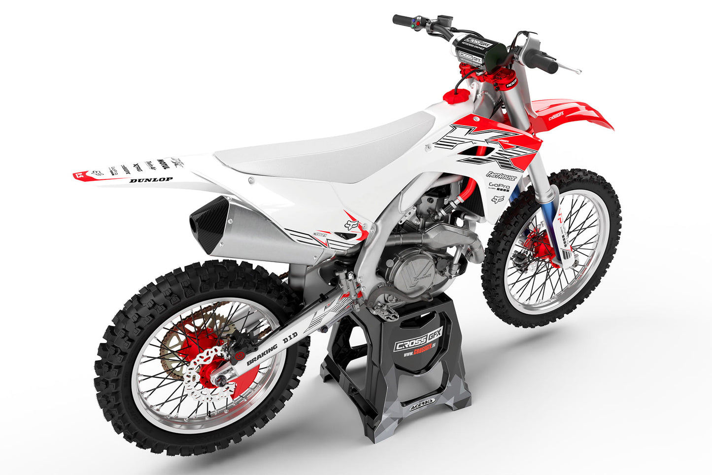 Rear view of the PEAK White graphics kit on a Kawasaki dirt bike.