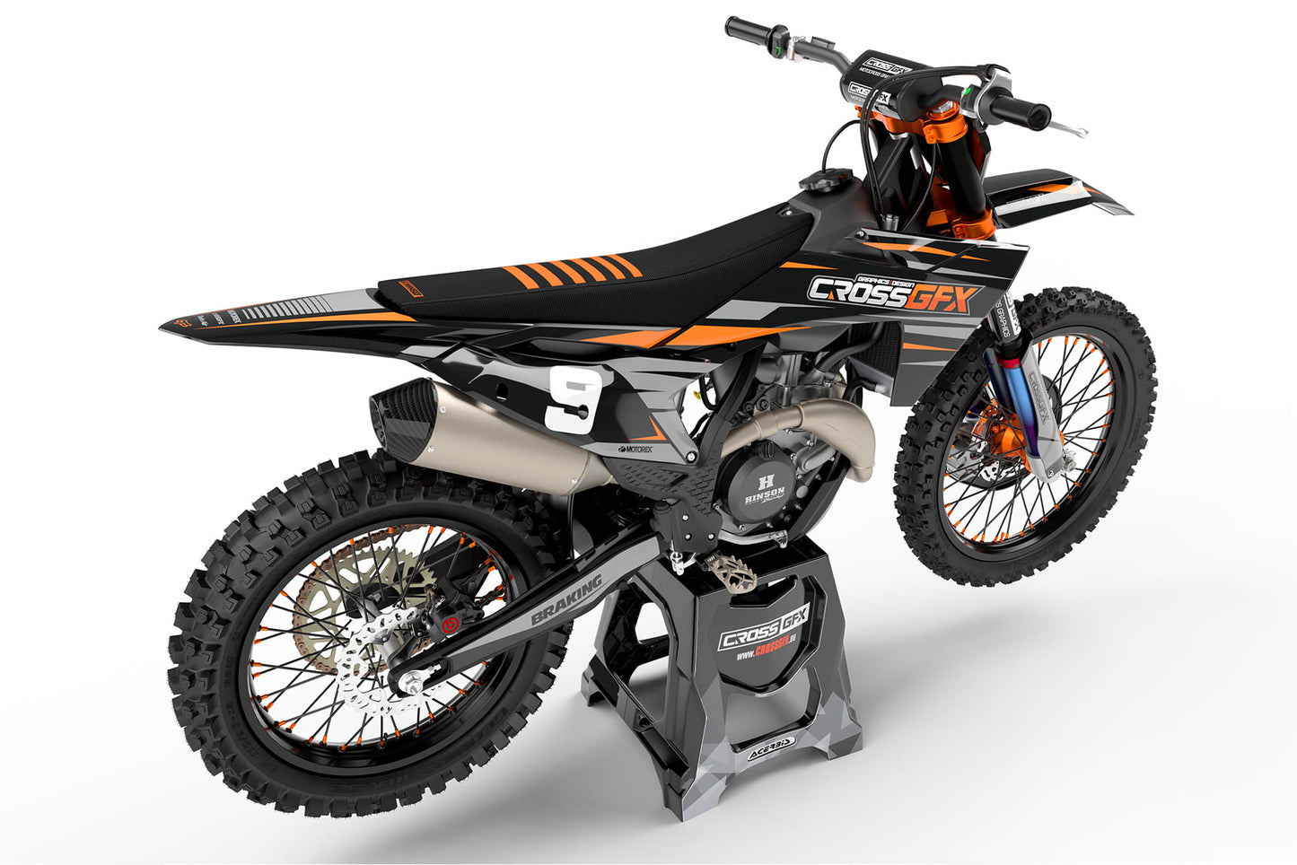 Rear view of the Apex Black racing graphics kit on a KTM dirt bike.