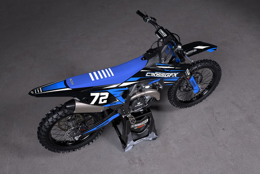 Promotional view of the Apex Blue custom decal kit on a KTM motorcycle.