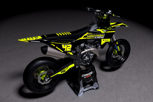 Promotional view of the Volt Fluorescent custom decal kit on a KTM motocross bike.