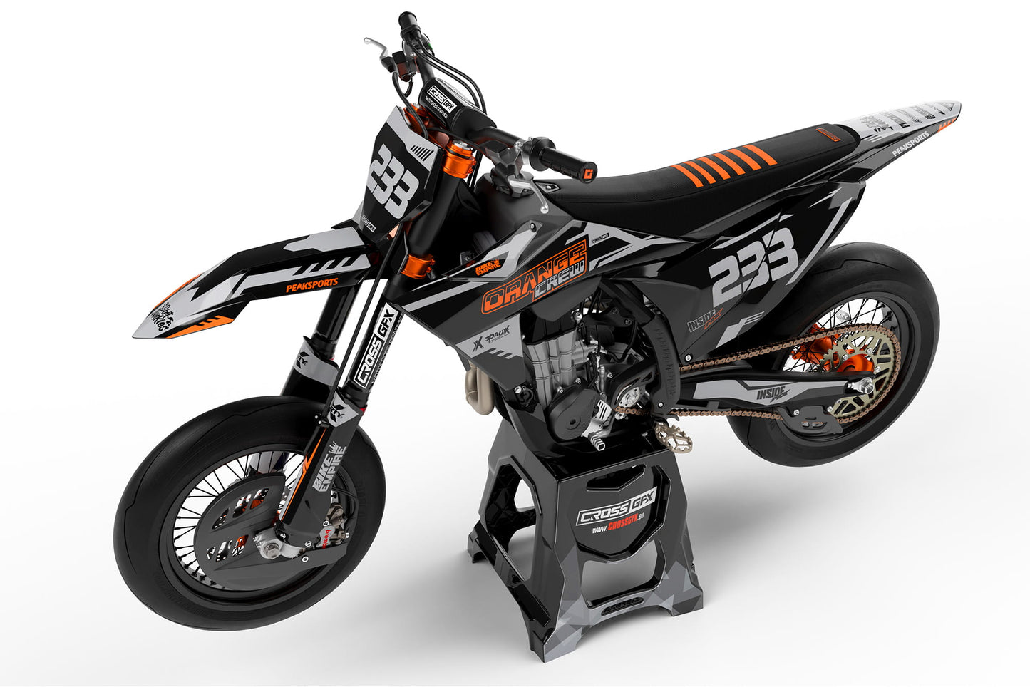 Side view of the Volt Grey racing graphics kit on a KTM dirt bike.
