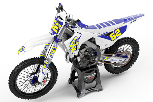Side view of the Retro 94 White custom decal kit on a Honda dirt bike.