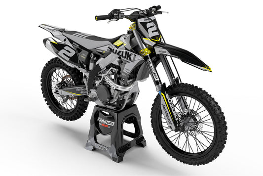 Front view of the Blitz Black motocross graphics kit on a Suzuki dirt bike.