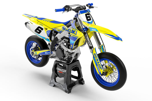 Front view of the Standard Blue motocross graphics kit on a Suzuki dirt bike.