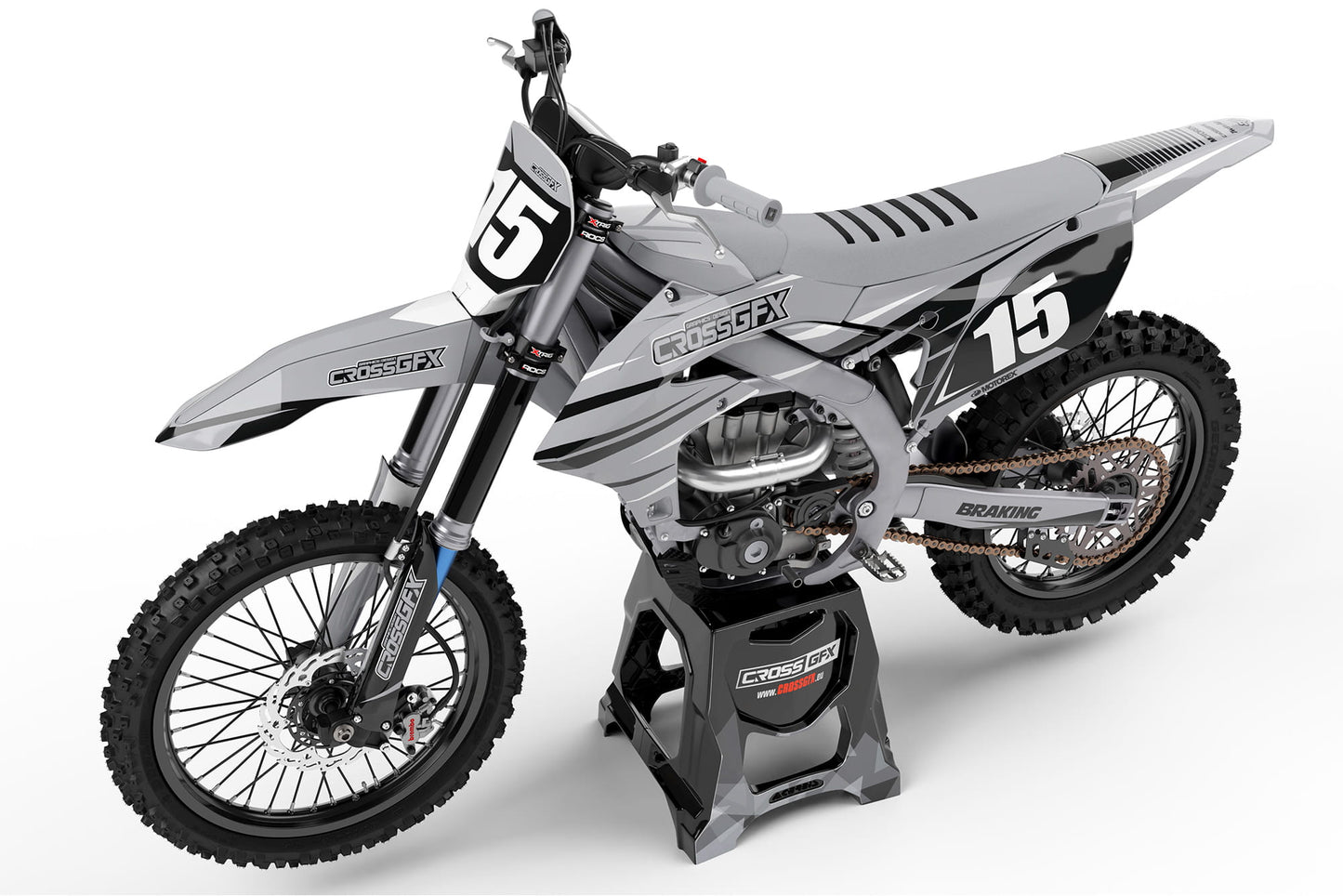 Left side view of the Apex Grey racing graphics kit on a Yamaha dirt bike.