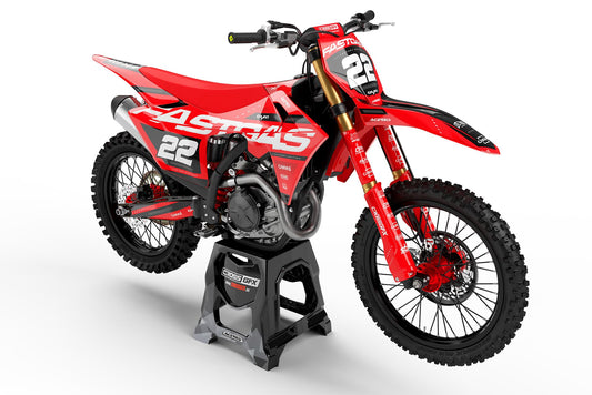 Front view of the Pulse Red motocross graphics kit on a GasGas dirt bike.