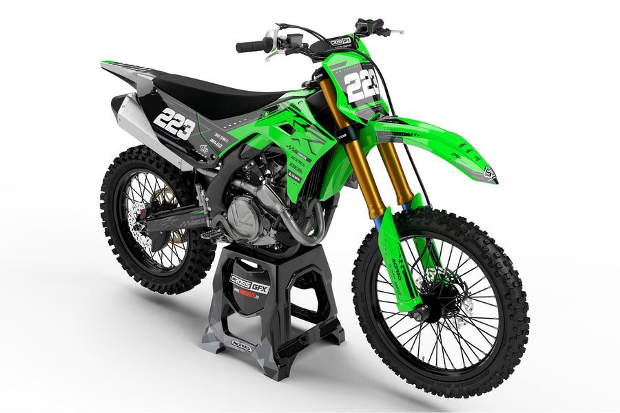 Front view of the Flux Green motocross graphics kit on a Kawasaki dirt bike.