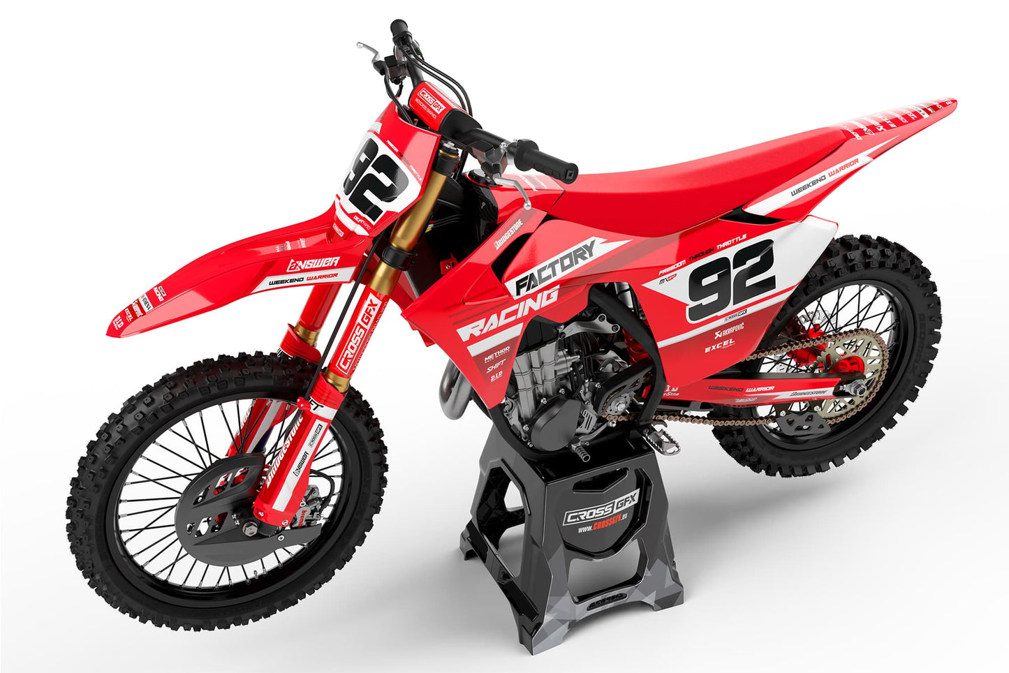 Left side profile of the Factory Red racing stickers on a GasGas dirt bike.