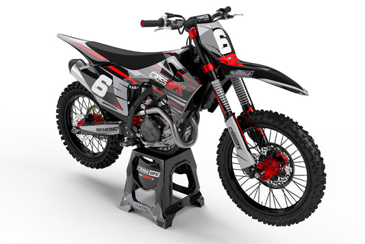 Front view of the Apex Black motocross graphics kit on a GasGas dirt bike.