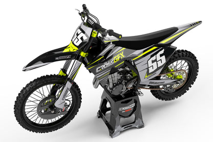 Side view of the Apex Fluorescent racing graphics kit on a GasGas dirt bike.