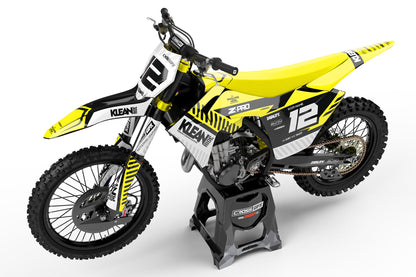 Side view of the Clean Yellow racing graphics kit on a GasGas dirt bike.