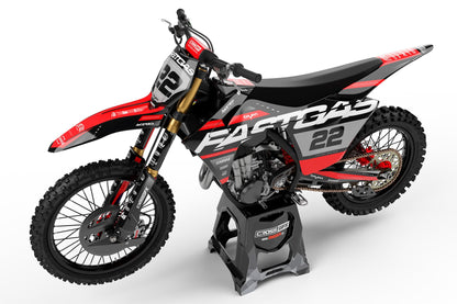 Left side view of the Pulse Black racing graphics kit on a GasGas dirt bike.
