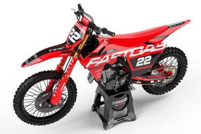 Left side view of the Pulse Red racing graphics kit on a GasGas dirt bike.