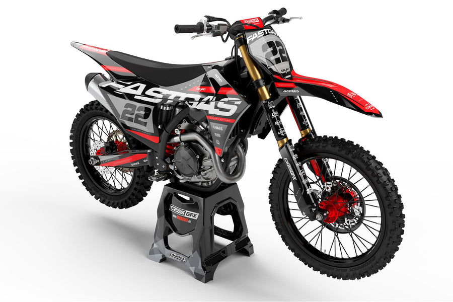 Front view of the Pulse Black motocross graphics kit on a GasGas dirt bike.