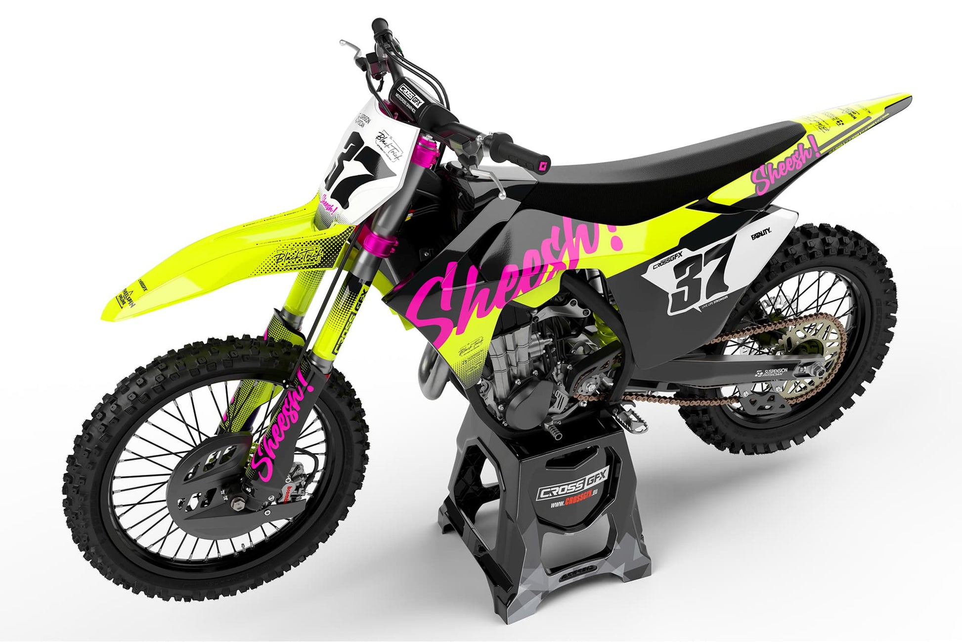 Side view of the Sheesh Fluorescent racing graphics kit on a GasGas dirt bike.