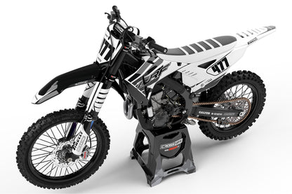 Perspective view of the Crisp White off-road graphics kit on a Honda dirt bike.