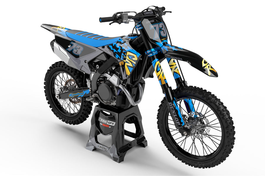 Front view of the Retro 97 Blue graphics kit on a Honda off-road motorcycle.