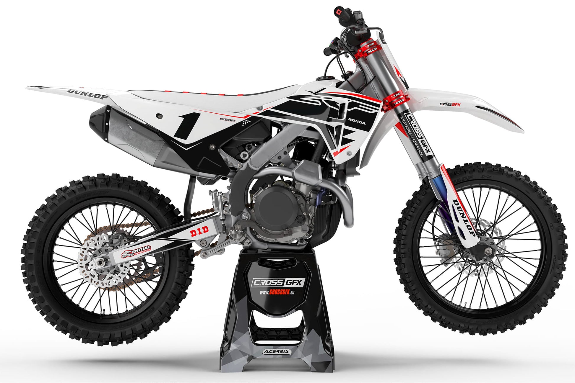 Left side view of the Surge Black graphics kit on a Honda dirt bike.
