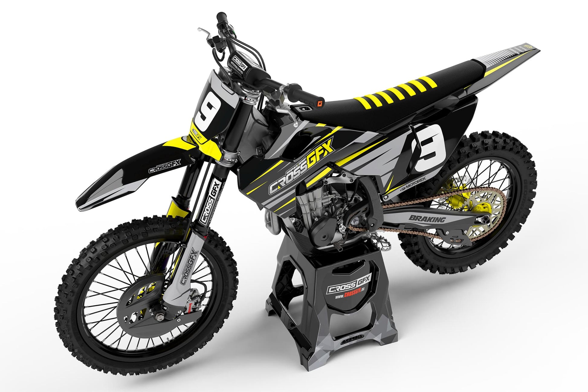 Side view of the Apex Black custom graphics kit on a Husqvarna dirt bike.