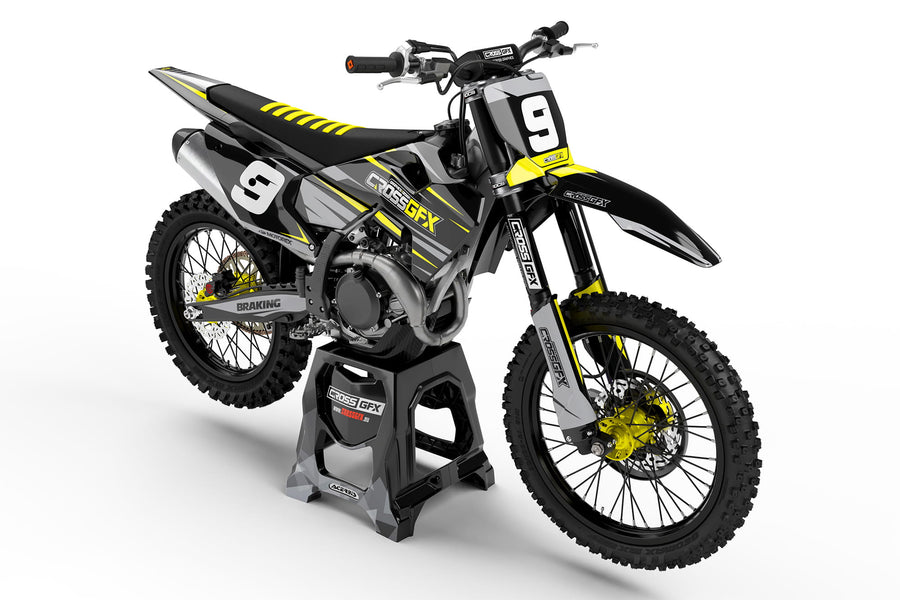 Front view of the Apex Black graphics kit on a Husqvarna motocross bike.