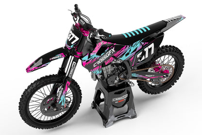 Left side view of the Element Black custom graphics kit on a Husqvarna dirt bike.