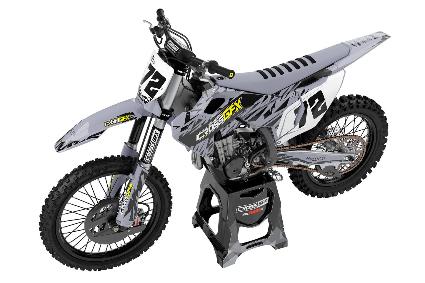 Side view of the Element Grey custom graphics kit on a Husqvarna dirt bike.