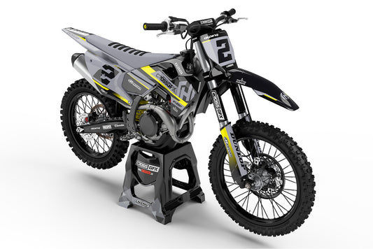 Front view of the Xcel Black graphics kit on a Husqvarna motocross bike.