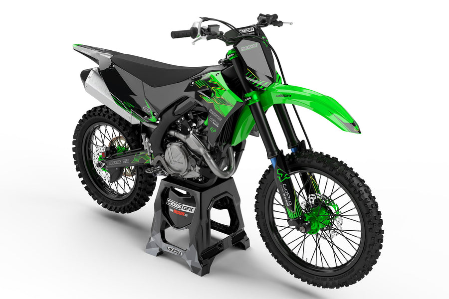 Front view of the PEAK Green graphics kit for a Kawasaki dirt bike.