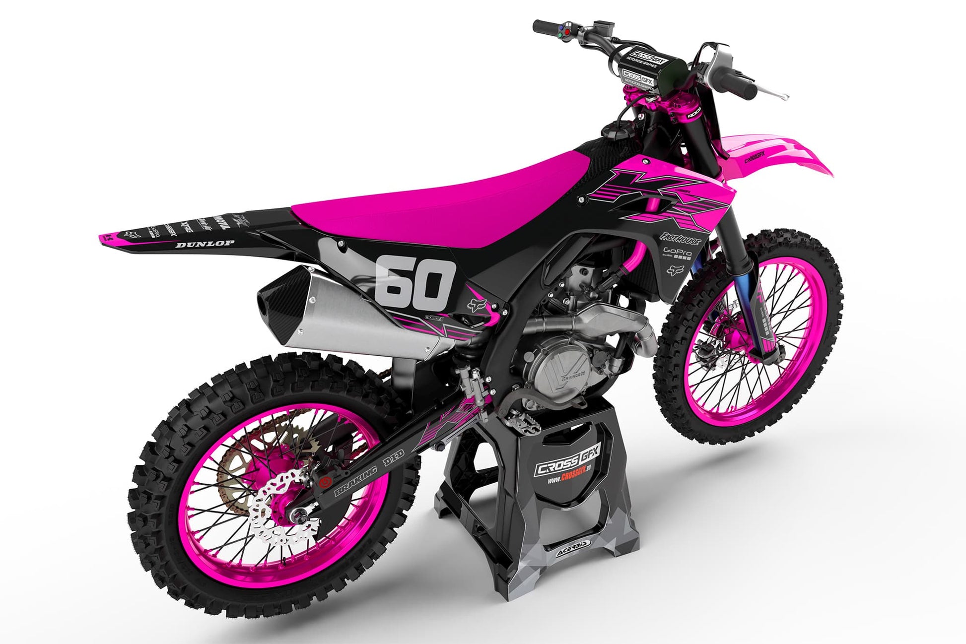 Rear view of the PEAK Pink graphics kit on a Kawasaki dirt bike.