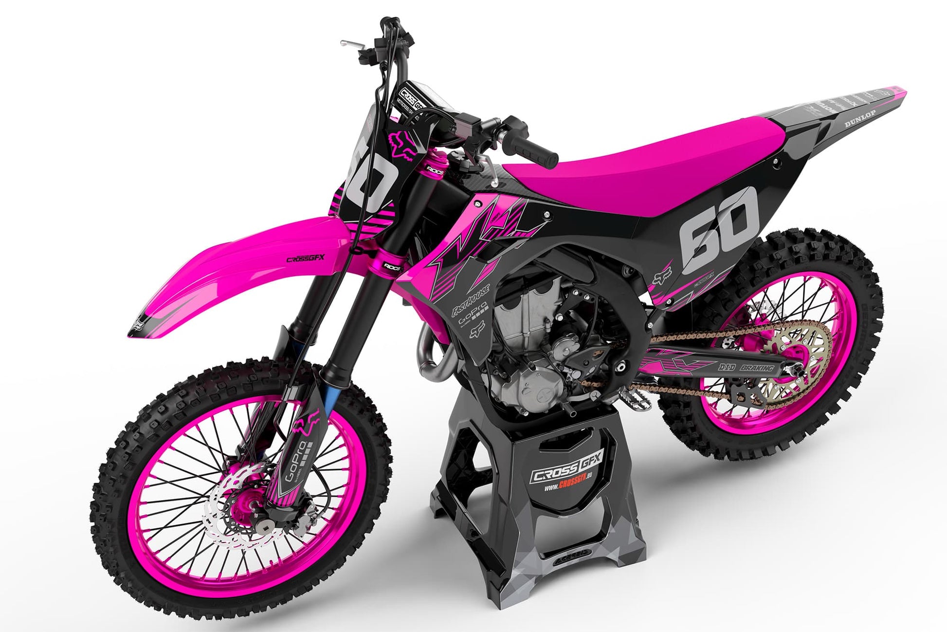 Left side view of the PEAK Pink graphics kit for a Kawasaki motocross bike.