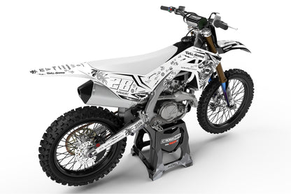 Rear view of the Skull White decals kit on a Kawasaki dirt bike.
