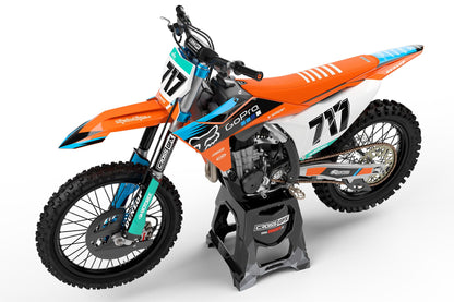 Side view of the Cord Orange off-road decal kit on a KTM motorcycle.