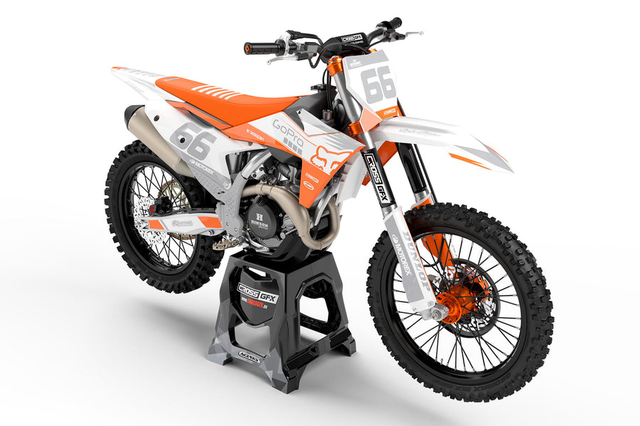 Front view of the Cord White retro motocross graphics kit on a KTM dirt bike.