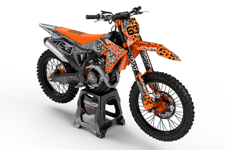 Front view of the Orange Panther enduro graphics kit on a KTM motorcycle.